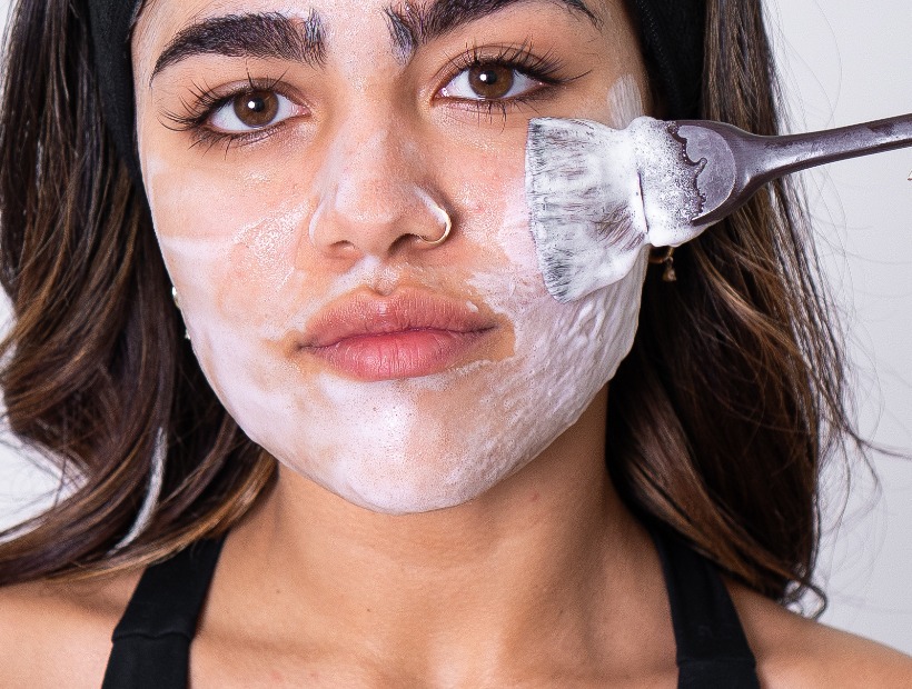 Client mid-treatment during a Faced. facial