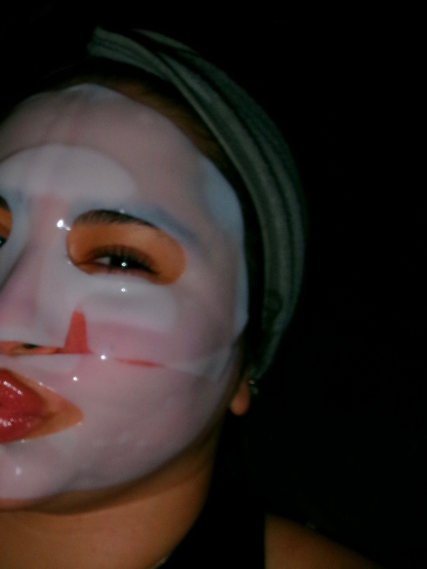 Client relaxing in a hydrating sheet mask